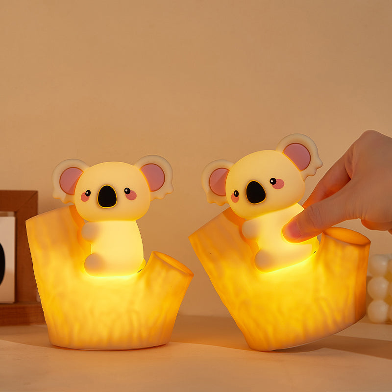 Koala glow night light turned on with soft warm light